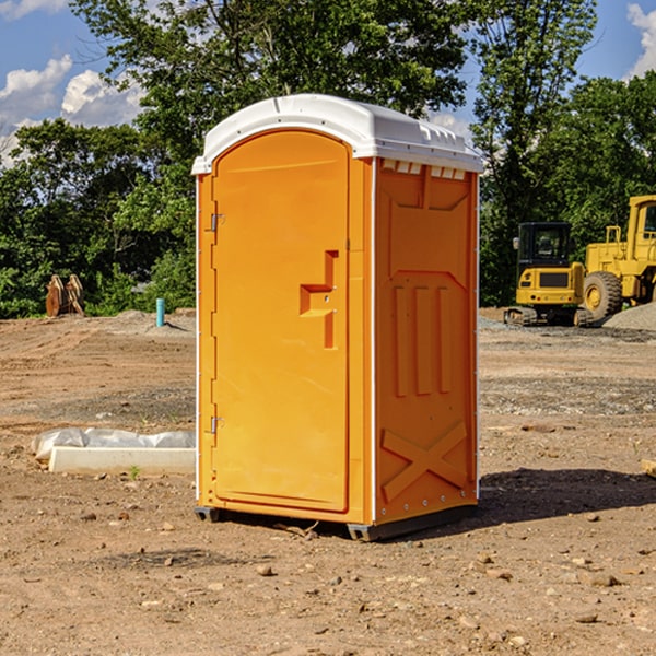 what is the cost difference between standard and deluxe portable toilet rentals in Blades